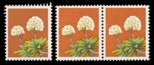 1975 (SG.608a) 18c Wildflower, a horizontal pair and a single, all with the variety BLACK (Australia 18) OMITTED; together with a normal stamp for comparison, (4) MUH. BW: 725c