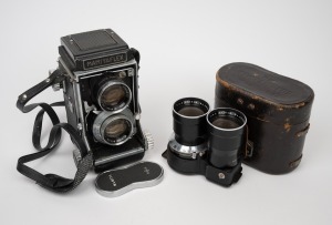 MAMIYA: Mamiyaflex C2 TLR camera, c. 1958, with Miya-Sekor M 80mm f2.8 lens (with cap), plus additional Mamiya-Sekor 180mm f4.5 lens in matching leather case.