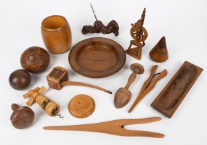 Assorted treen ware including glove stretchers, miniature spinning wheel, corkscrews, carved nut ornament, alms bowl etc., (qty).
