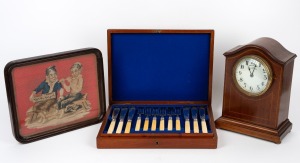 An antique framed embroidery; together with an antique EUREKA CLOCK Co. case (movement later converted to quartz) and an antique fish cutlery set in original canteen, (3 items), the embroidery 37 x 42cm overall.