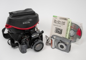VARIOUS MANUFACTURERS: 1989 Minolta Maxxum 5000i SLR camera with lens filter and leather case, together with 2002 Canon PowerShot A40 digital camera with manual and software CDs. (2 cameras)