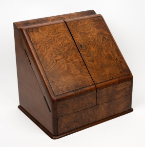 An antique English burr walnut compendium with fitted interior and calendar top, 19th century, ​​​​​​​31cm high, 31cm wide, 26cm deep.