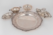 A fine quality Dutch silver bonbon dish with cast and pierced decoration together with two pierced silver dishes, a silver ink stand plus a silver plated salver made by Hardy Bros, (5 items).
