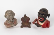 Three hand-painted cast metal money boxes, mixed vintages and condition, the largest 14cm high.