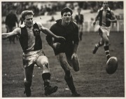 A collection of original photographs, including a very rare example of later AFL CEO Ross Oakley in St Kilda uniform titled 'SCHOOLBOYS CLINIC, HOBART 23rd August, 1964', together with other examples of action photographs featuring Oakley. (Approx. 30 pho - 5
