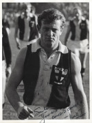 A collection of original photographs, including a very rare example of later AFL CEO Ross Oakley in St Kilda uniform titled 'SCHOOLBOYS CLINIC, HOBART 23rd August, 1964', together with other examples of action photographs featuring Oakley. (Approx. 30 pho - 7