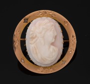 An antique Colonial 9ct gold and diamond cameo brooch, most likely South Australian origin, circa 1870, stamped "9ct" flanked by two crowns, 4cm wide, 8.7 grams total.