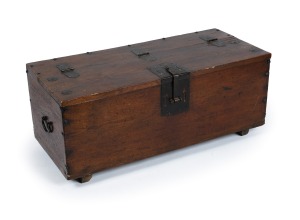 An antique Korean lift-top storage box with iron fittings, 19th century, 45cm high, 85cm wide, 38cm deep.