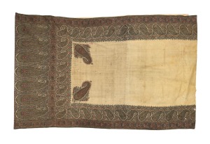 An antique Kashmir paisley shawl/wall-hanging, 18th/19th century, as is condition with numerous faults and losses but still presents handsomely, 131 x 205cm.