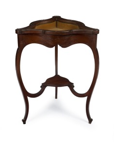 An antique triangular form walnut bijouterie display table, late 19th century, 73cm high, 56cm wide, 52cm deep.