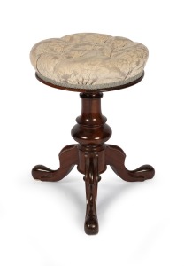 An antique English mahogany revolving piano stool, 19th century, 50cm high.