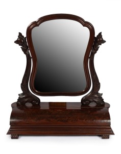 An antique English flame mahogany dressing mirror bearing original importer's and retailer's label "ALEX.r MOORE & Co. FURNITURE BROKERS, LABOUR BAZAAR, PITT STREET, SYDNEY", mid 19th century, 90cm high, 83cm wide, 35cm deep.