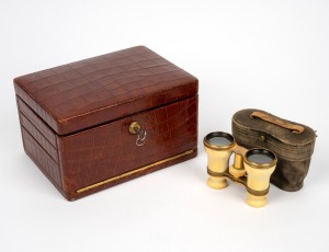 A fine quality antique English crocodile skin jewellery box, handsomely fitted in green velvet with fall front and concertina compartments, manufactured by Edwards & Sons of Regent Street, London; together with antique ivory opera glasses in original leather case, (2 items), the jewellery box 20cm wide.