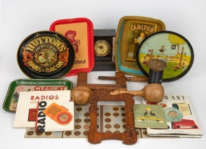 An antique time only mantle clock in marble and black slate case, together with a group of vintage and reproduction bar trays, cotton reel, timber frame, clap and club, books on Radios, assorted coins, 19th/20th century, (qty). the club 46cm long.