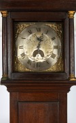 An antique English oak longcase clock by GEORGE HEWETT of Marlborough with engraved silvered dial, early 19th century, 205cm high. - 2
