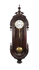 An antique Vienna regulator wall clock in stained walnut case, single weight time only movement with Roman numerals, 19th/20th century, 120cm high.