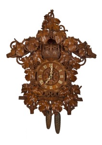 BLACK FOREST antique German cuckoo and quail wall clock, three train weight driven movement sounding the cuckoo, quail and coil gong on the quarters. Fruitwood chalet style case with fine quality carved grapevine decoration, original bone hands to the Rom