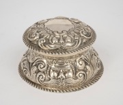 An antique sterling silver inkpot with glass and porcelain lining, 6cm high, 11cm diameter, 144 grams (not including lining).