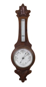An antique English banjo wall barometer with mercury thermometer in oak case with carved decoration, 19th/20th century, ​​​​​​​91cm high.