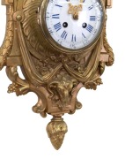 An antique French Cartel clock in gilt metal case with ram's head decoration, eight day time and strike movement with Roman numerals under convex glass, 19th century, note: later painted gold finish. ​​​​​​​53cm high. - 3