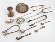Sterling silver dish, assorted sugar tongs, spoons, tea infuser etc., 19th and 20th century, (12 items), 150 grams total.