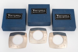 WHITEHILL set of three sterling silver napkin rings in original card boxes, late 20th century, 6.5cm wide, 66 grams total.