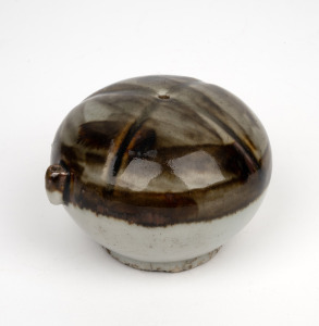 An antique Korean water dropper of globular form glazed in brown and celadon, Joseon Dynasty, 19th century, 7cm high, 9cm wide.