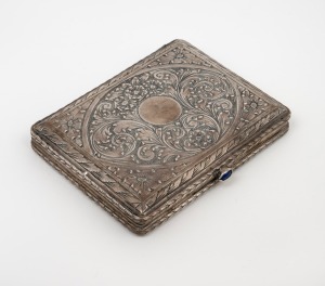 A Continental 800 silver box with engraved decoration and cabochon blue stone clasp, circa 1900, 7.5cm wide, 81 grams.