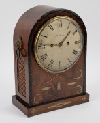 An antique English mahogany arch top spring table clock with ebony banding and brass inlay, convex painted dial with Roman numerals, minute track and cast brass bezel. Signed "Jms. Martin, Bath". Eight day two train fusee movement striking the hours on a - 2