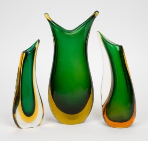 Three green and amber sommerso glass vases, ​​​​​​​the largest 24cm high.