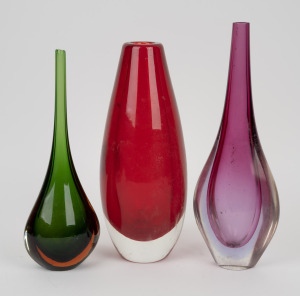 A red Murano glass vase; together with a purple sommerso stem vase and a green and amber sommerso stem vase, (3 items), the largest 33cm high.