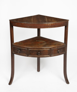 A Georgian mahogany corner washstand with cock-beaded drawer fronts, 19th century, 82cm high, 70cm wide, 50cm deep.