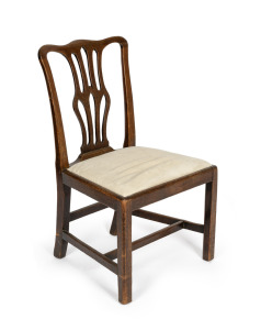 A Georgian mahogany dining chair with drop-in seat and Hepplewhite back, 18th century, 91cm high.