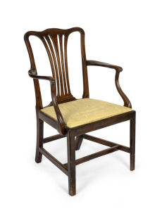 A Georgian mahogany carver chair with yellow upholstered drop-in seat, 18th century, 58cm across the arms.