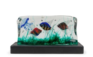 ALFREDO BARBINI (1912-2007) large aquarium glass fish block with three fish and a jellyfish, made from three layered slab of clear glass and housed on bespoke illuminating base, for VETRERIA ALFREDO BARBINI, circa 1950, (A/F), 17cm high, 35cm long, 6cm de