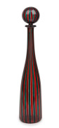 FULVIO BIANCONI (1915-1996) and PAOLO VENINI (1895-1959) lidded Murano glass decanter with green and red canes, for VENINI & Co., Murano, circa 1994, engraved "Venini, '94" and bearing original label "Venini, Murano, Made in Italy", 46cm high.