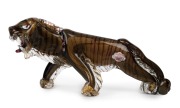 ALFREDO BARBINI (1912-2007) Murano glass angry tiger statue, for VETRERIA ALFREDO BARBINI, circa 1960, bearing retailer's label "Venetian, Made by Alfredo Barbini, R. Weil Ceramics & Glass, Murano, Italy", 17cm high, 37cm long.