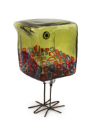 ALESSANDRO PIANON (1931-1964) "Pulcino" baby bird in cube form in green/gray glass decorated with blue and red murrines with millefiori eyes and copper wire leg stands, made for VISTOSI, circa 1960, 21.5cm high.