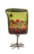 ALESSANDRO PIANON (1931-1964) "Pulcino" baby bird in cube form in green/gray glass decorated with blue and red murrines with millefiori eyes and copper wire leg stands, made for VISTOSI, circa 1960, 21.5cm high. - 2