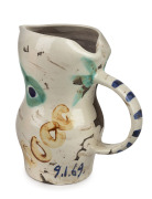 PABLO PICASSO (1881-1973) "Visage Aux Points" pottery jug, for MADOURA, circa 1969, impressed "Madoura, Plein Feu. Edition Picasso", incised "Edition Picasso, 34/500, Madoura" and dated in blue underglaze "9.1.69", 29cm high. - 2
