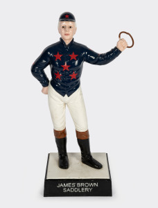 "JAMES BROWN SADDLERY" cast iron jockey hitching post statue with painted finish, 20th century, 74cm high.
