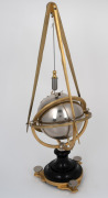 A rare antique French conical pendulum desk clock in nickel plated spherical case with eight day time and strike movement. The gilded tripod stand suspending the pendulum on black marble pontil base with gilt table mount and level adjustment screws, circa - 2