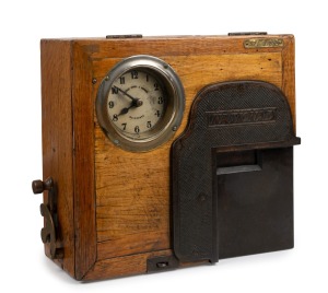 NATIONAL timecard recording clock in oak case, circa 1900, ​​​​​​​32cm high.