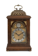 CHARLES FRODSHAM antique English table clock in walnut case, timepiece only with Roman numerals, bearing maker's plaque "Chas. Frodsham, Clock Maker to H.M. The King", early 20th century, 30cm high.