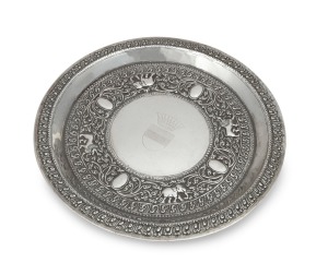 An antique Indian silver salver with repousse decoration of elephants and tigers, bearing engraved coronet with nine pearls signifying a viscount with shield below, 19th century, maker's stamp "S.S.", 25.5cm diameter, 311 grams.
