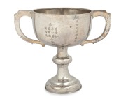 An antique Chinese export silver two handled trophy cup with Chinese inscription, 19th/20th century, 17.5cm high, 21cm wide, 383 grams.