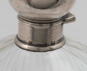 A pair of antique sterling silver mounted crystal scent bottles, late 19th century, ​​​​​​​14.5cm high. - 2