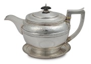 George III antique English sterling silver teapot and stand with bright cut foliate decoration, bearing coat of arms with the motto "VIGET IN CINERE VIRTUS" (Virtue thrives in ashes), by John Emes of London, 1805, (2 items), the teapot 15cm high, 25cm wid