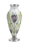 A fine American Art Nouveau sterling silver bud vase, adorned with engine turned guilloche enamel decoration with a repeating crocus motif, early 20th century, stamped "STERLING", 14cm high.