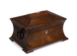 An antique English rosewood sewing box, attractively fitted with red silk lining, housing a handsome selection of antique mother of pearl and sterling silver sewing accessories, circa 1840, 14cm high, 27cm wide, 20.5cm deep.